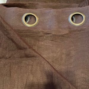 Brown sheet floor length curtains. 1 pair
